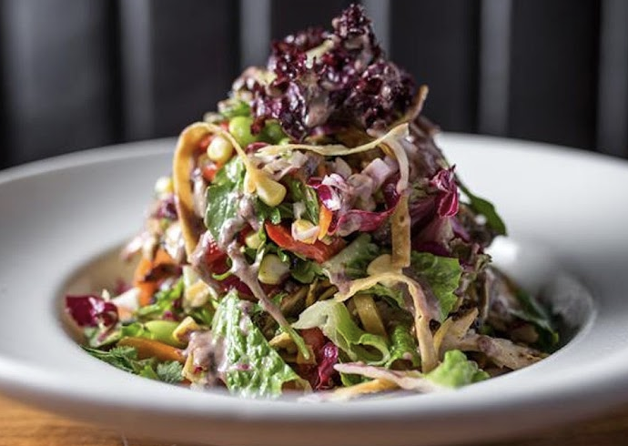 Doc B's Restaurant signature dishes California Salad
Brussels Sprout Salad
Chicken Wok Out Bowl